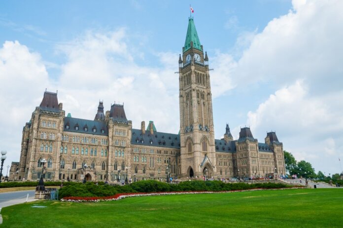 Stunning photo of Canada's Parliament Hill in Ottawa under a clear sky, showcasing Gothic Revival architecture. Stunning photo of Canada's Parliament Hill in Ottawa under a clear sky, showcasing Gothic Revival architecture.
