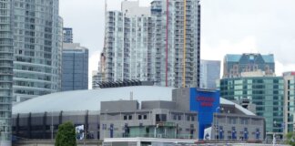 View of Vancouver's Rogers Arena with the surrounding cityscape and waterfront.