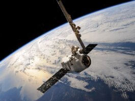 A satellite glides over Earth showcasing dramatic cloud formations and the vast expanse of space.