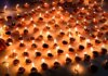 A vibrant collection of lit diyas symbolizing Diwali, the festival of lights, celebrating warmth and prosperity.