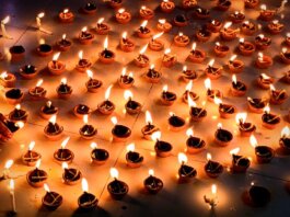 A vibrant collection of lit diyas symbolizing Diwali, the festival of lights, celebrating warmth and prosperity.