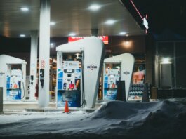 A well-lit gas station surrounded by snow during a winter night in St. John's, NL, Canada.