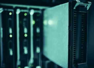 Зачем Meta строит дата-центры: глава инфраструктуры компании об основе для ИИ Close-up of server racks in a data center highlighting modern technology infrastructure.