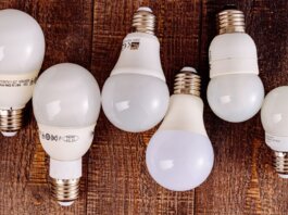 LED light bulbs arranged on a wooden surface, showcasing their modern design.