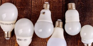 LED light bulbs arranged on a wooden surface, showcasing their modern design.